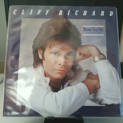 SINGLE / Cliff Richard – Never Say Die (Give A Little Bit More)