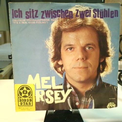SINGLE / Mel Jersey – Ich Sitz Zwischen Zwei Stühlen