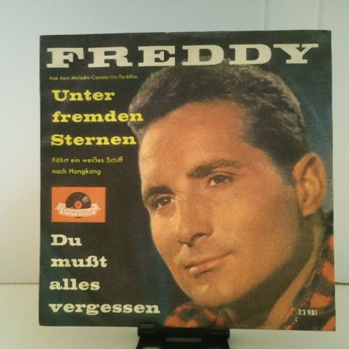 SINGLE / Freddy* – Unter Fremden Sternen / Du Mußt Alles Vergessen