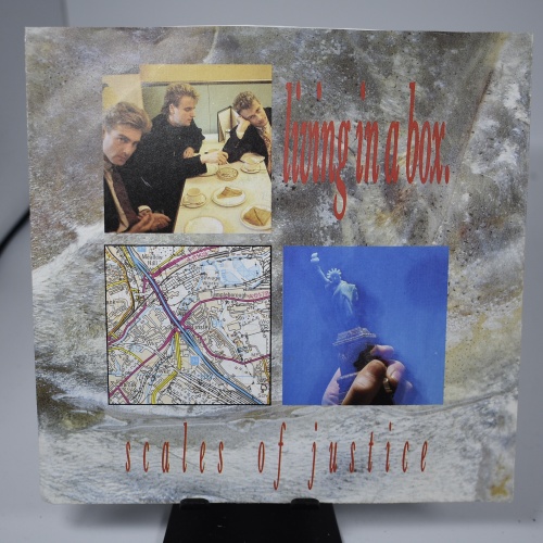 Single / Living In A Box – Scales Of Justice