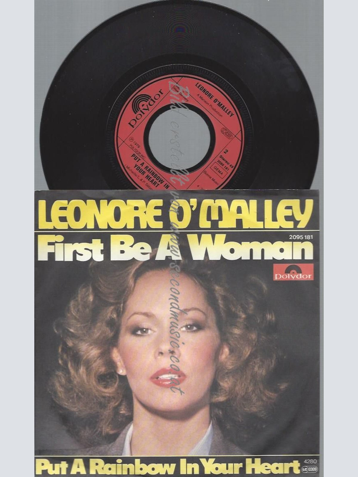 7"  Leonore O'Malley  First Be A Woman