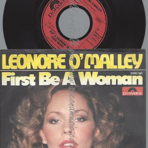 7"  Leonore O'Malley  First Be A Woman