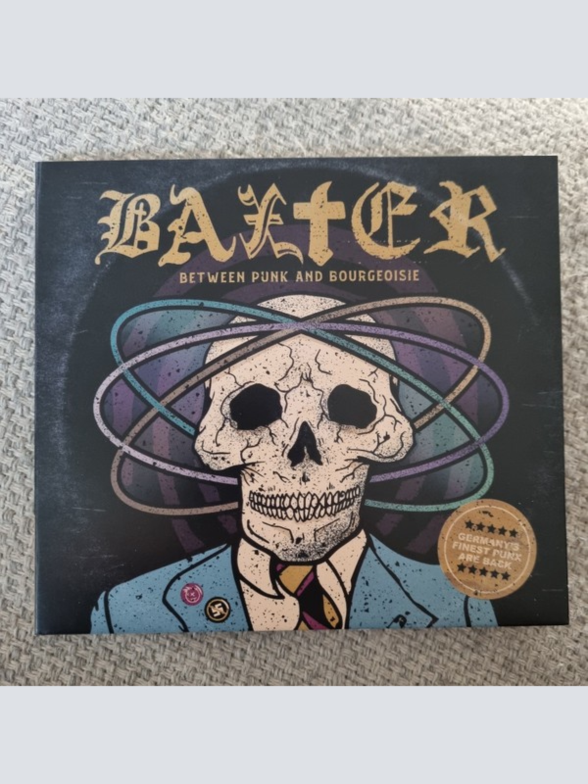 CD, Album Baxter (9) - Between Punk And Bourgeoisie