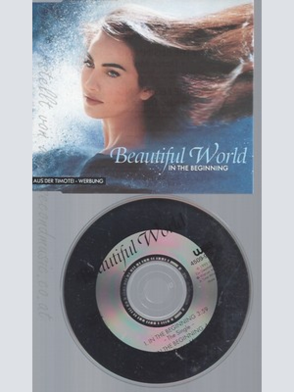 CD--BEAUTIFUL WORLD -- ----TIMOTEI COMMERCIAL-