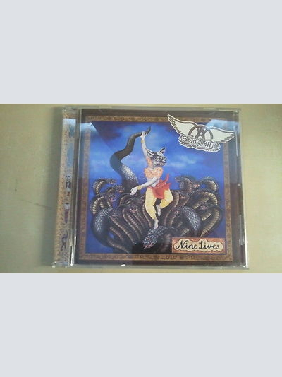 CD--AEROSMITH--NINE LIVES--DIFFRENT COVER------ALBUM