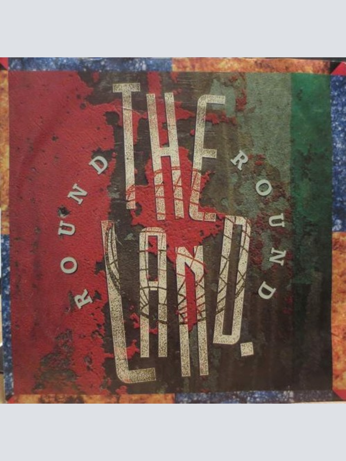 7", Single The Land - Round Round
