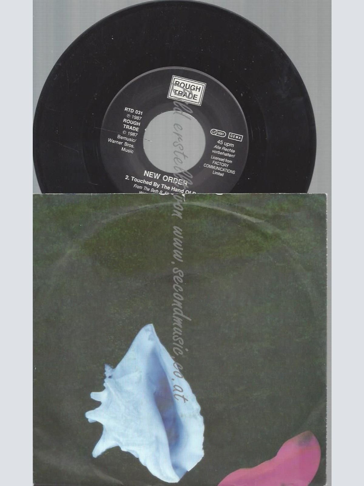 7"  New Order  Touched By The Hand Of God