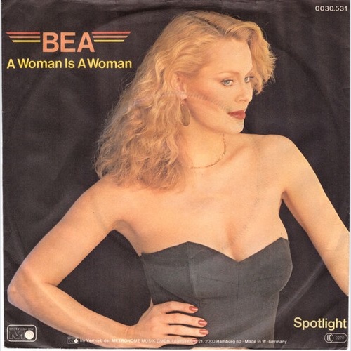 Bea - A Woman Is A Woman (7", Single)