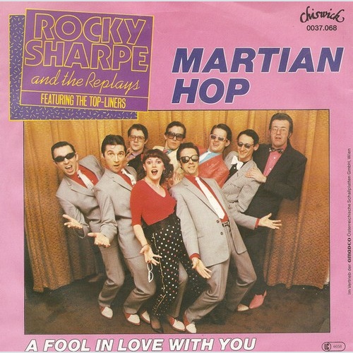 Rocky Sharpe & The Replays - Baile Marciano (7", Single)